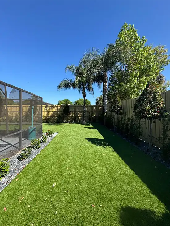 Backyard artificial turf design by Citrus Landscape Solutions