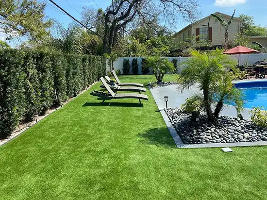 Poolside artificial turf installation