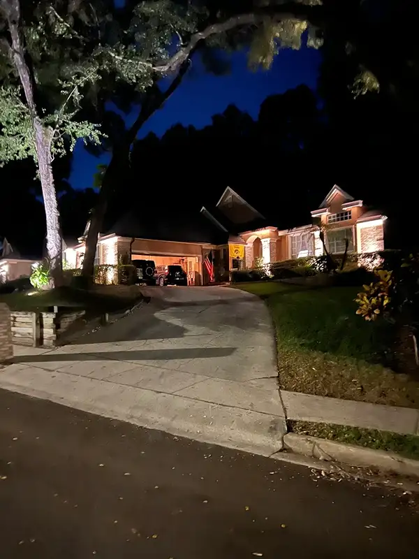 Landscape lighting at a South Pasadena, Florida bayfront home